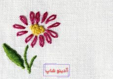 گلدوزی گل ساده روی پارچه