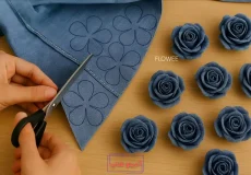 برش الگوی گل پنج پر روی پارچه لی آبی برای ساخت گل رز پارچه‌ای دست‌ساز
