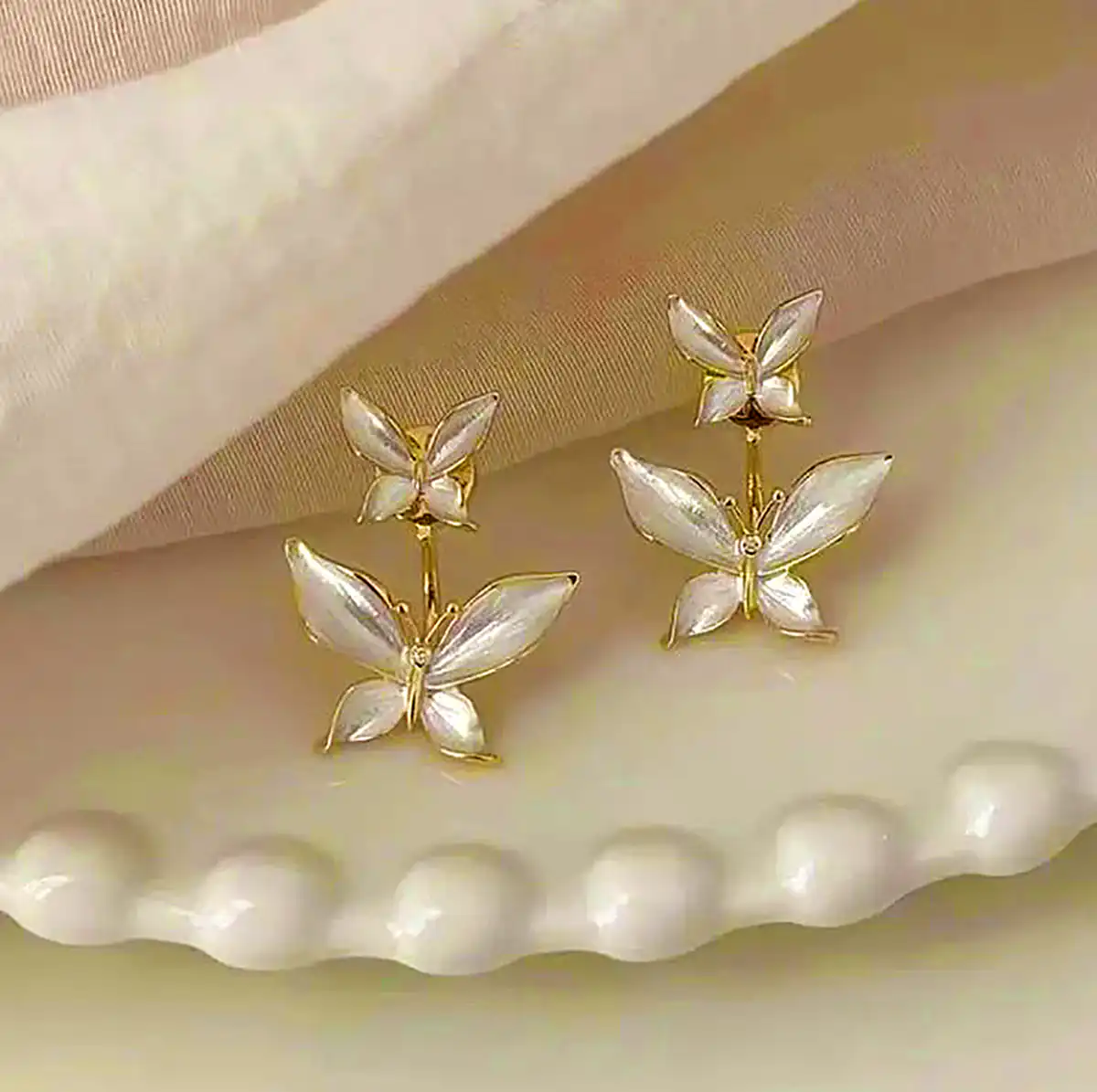 گوشواره سواروسکی پروانهای
