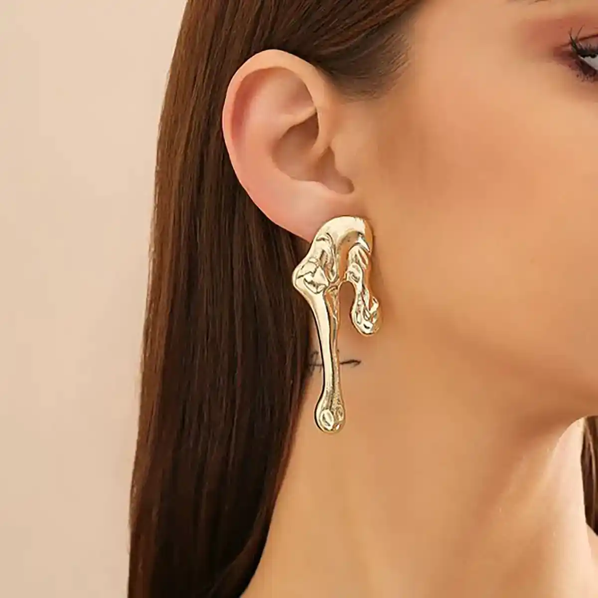 گوشواره شیک دفرمه طلا مدرن