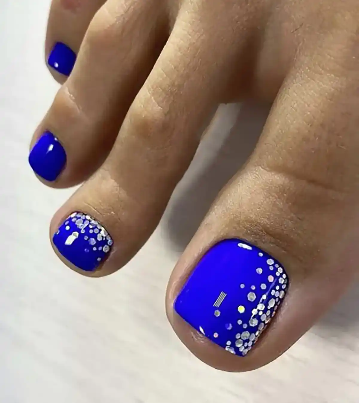 لاکژل آبی کاربنی ناخن پا