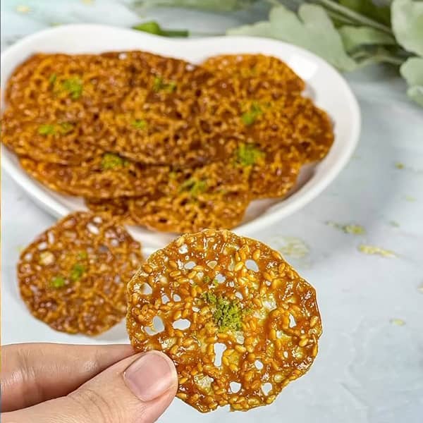 سوهان توری بابا رحیمی طرز تهیه سوهان کنجدی توری آپارات سوهان توری بدون خامه سوهان کنجدی توری بدون فر سوهان مشبک یا توری طرز تهیه سوهان بدون فر اموزش سوهان کنجدی توری