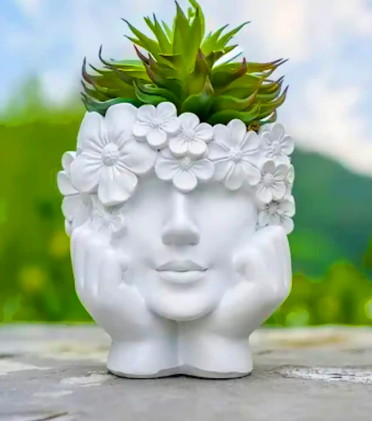 گلدان با طرح سر انسان