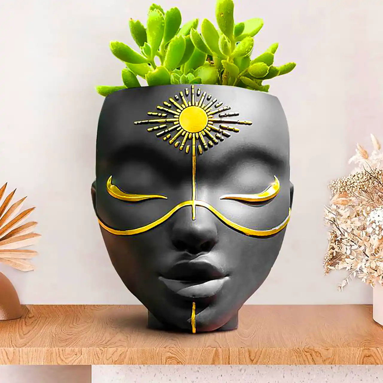 گلدان با طرح سر انسان