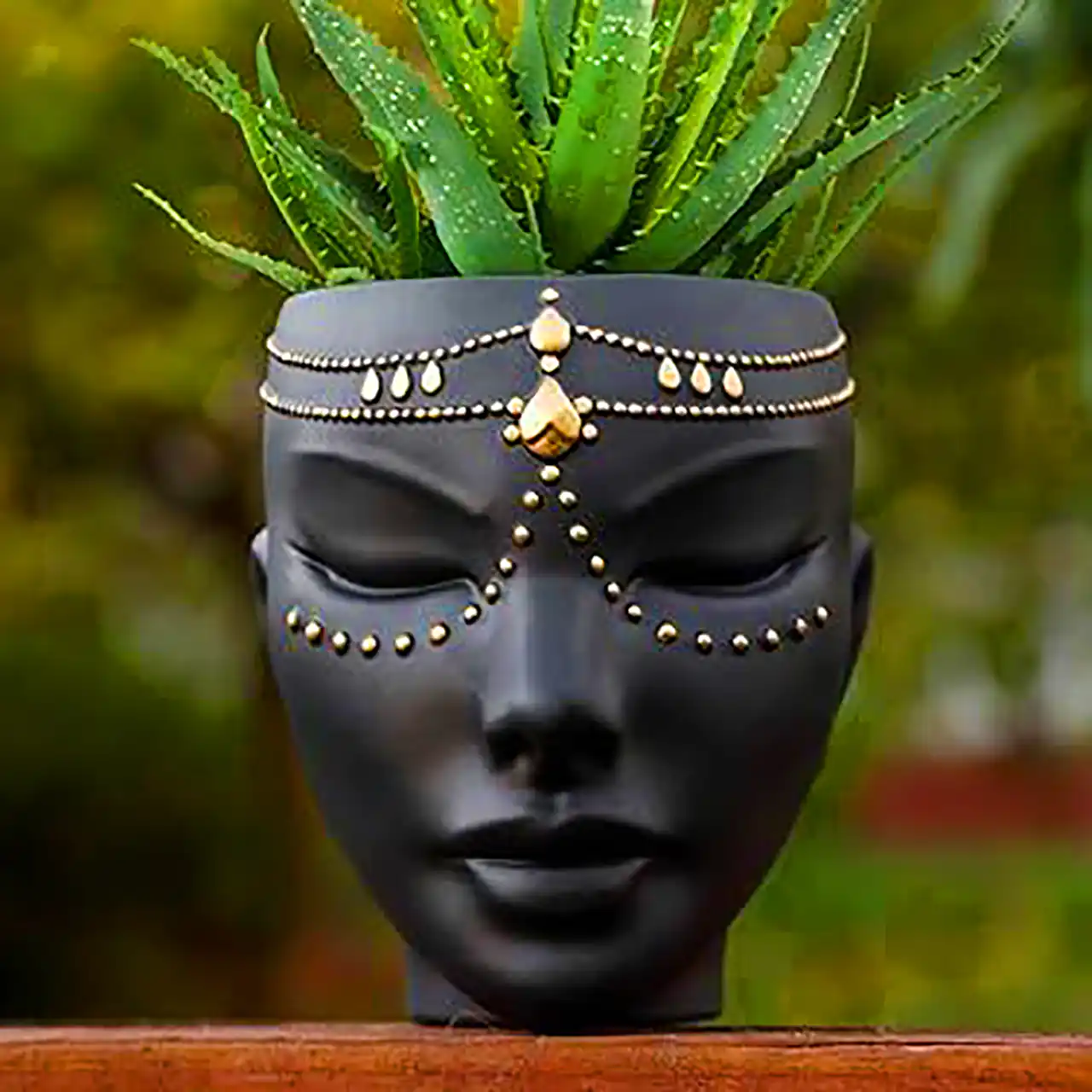 گلدان با طرح سر انسان