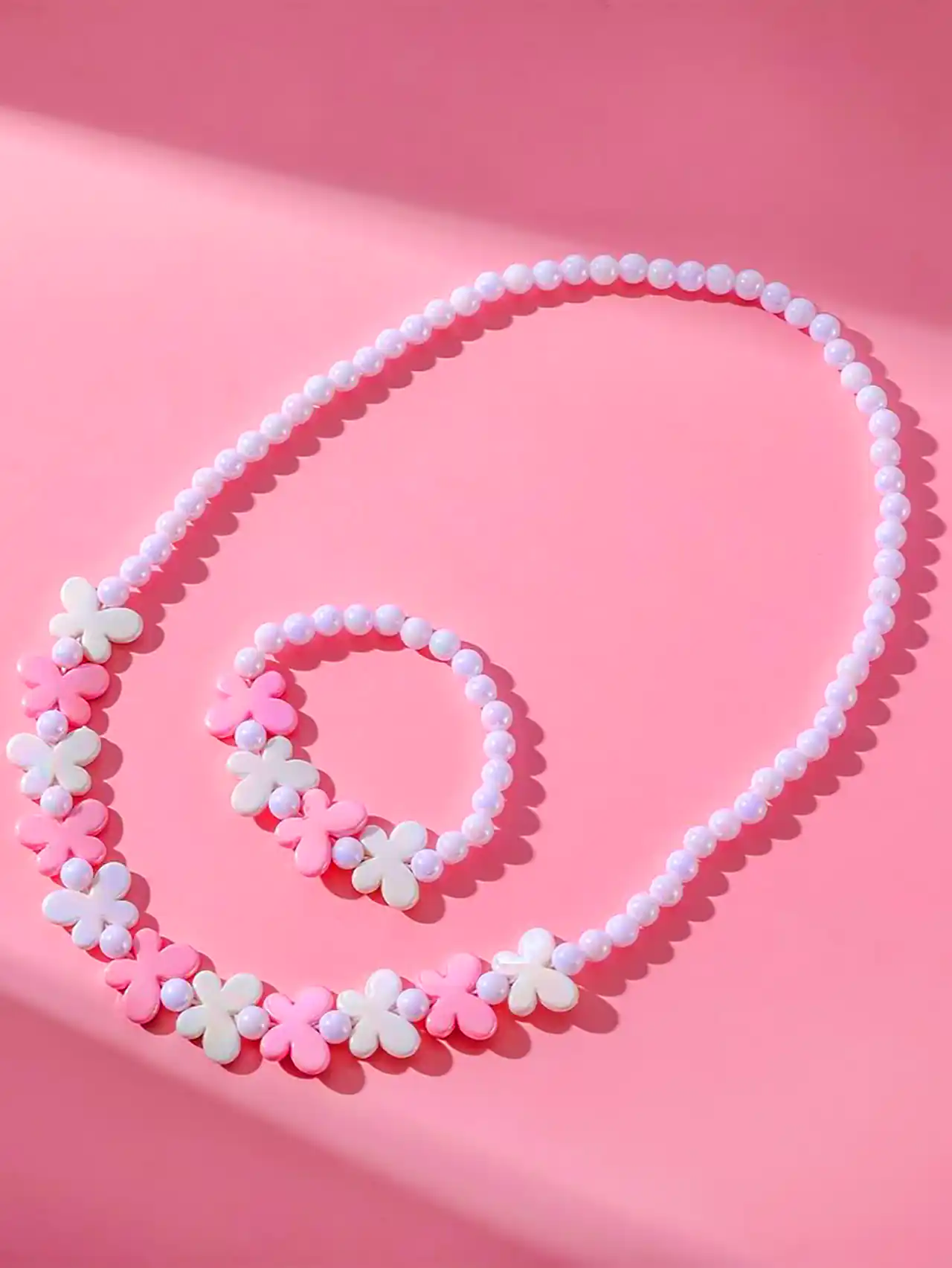 ست گردنبند و دستبند مرواریدی صورتی