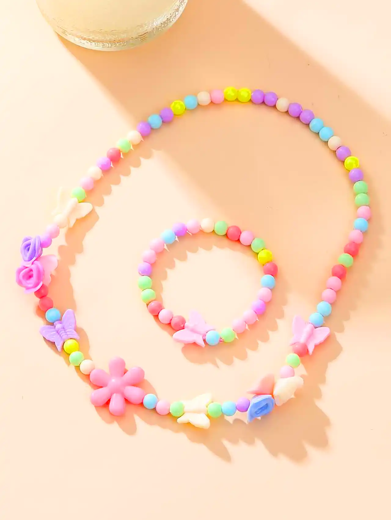 ست گردنبند و دستبند مرواریدی صورتی