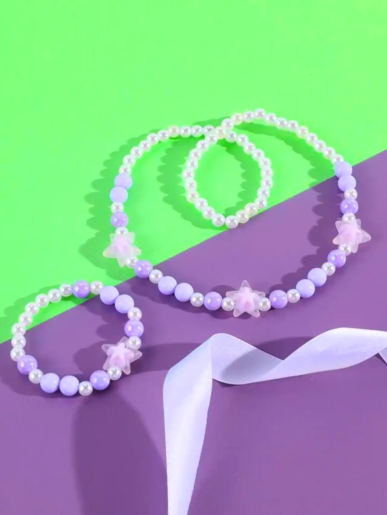 ست گردنبند و دستبند مرواریدی صورتی