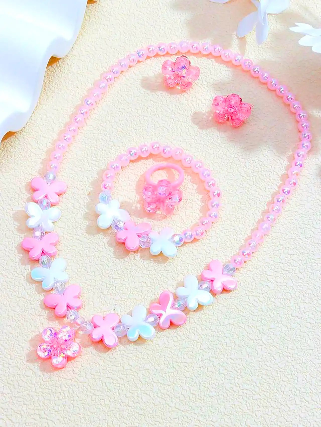 ست گردنبند و دستبند مرواریدی صورتی