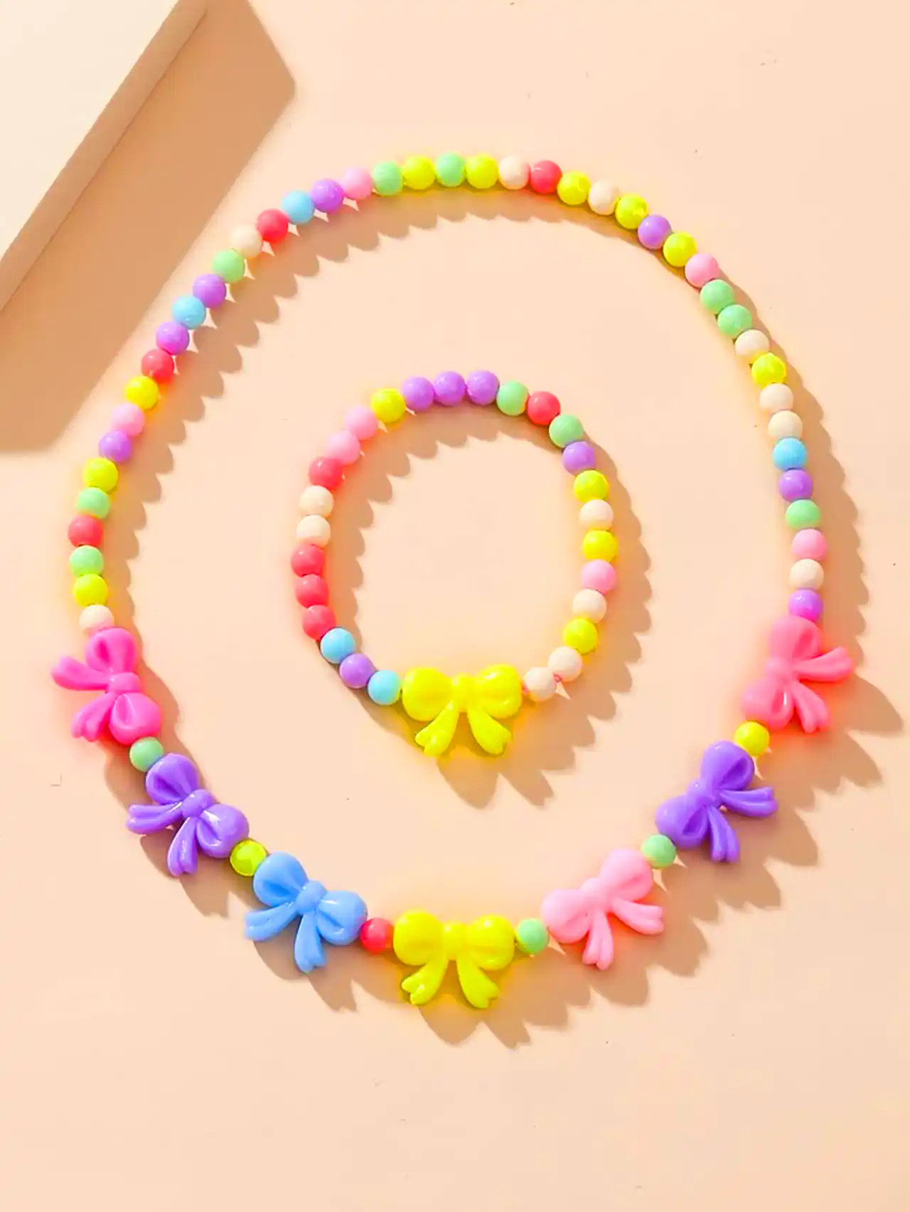 ست گردنبند و دستبند مرواریدی صورتی